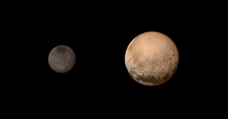 Pluto and its largest moon, Charon, could be considered a double planet. The balance point between them is between them in space, not within Pluto, so they're orbiting together around a point in space. This is our first mission to a double planet.