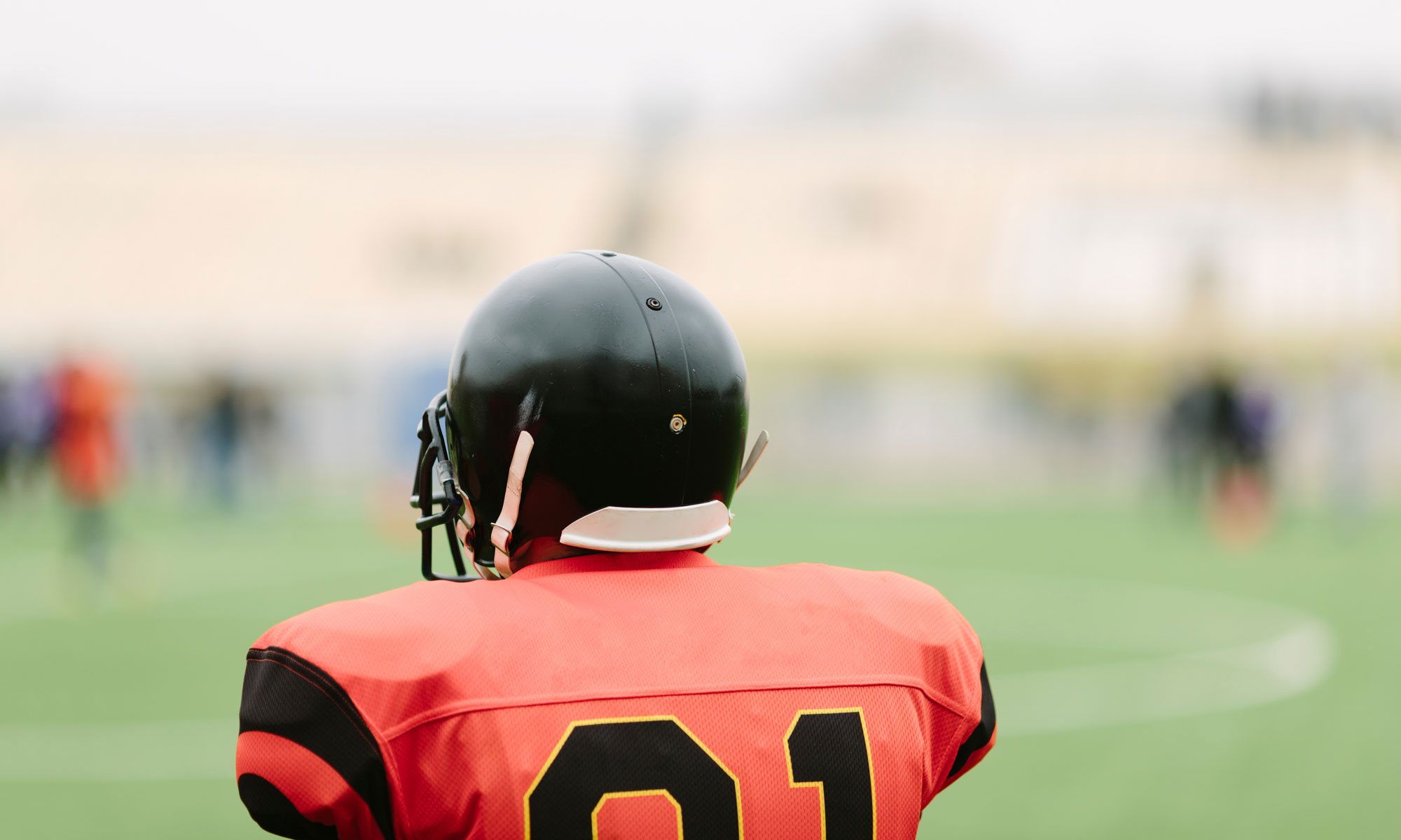 Football helmets don’t protect against concussion — and we’re not sure